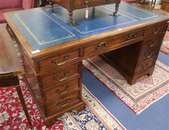 A late Victorian mahogany pedestal desk, retailed by S & H Jewell, W.150cm